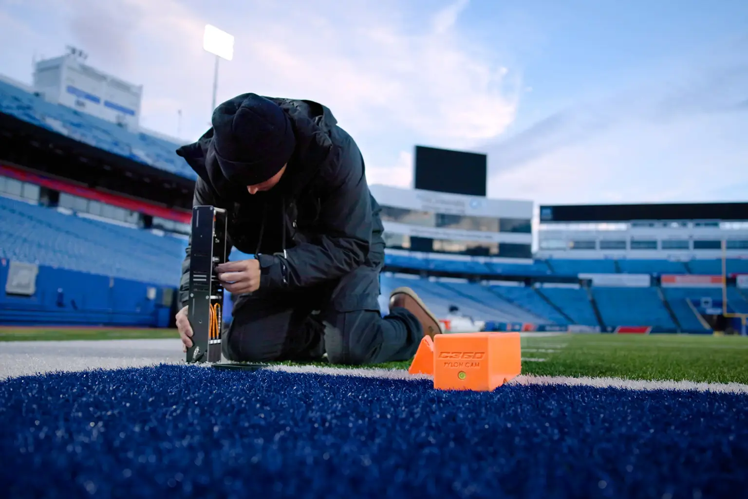 Camera and pylon setup on a sports field for an immersive broadcast