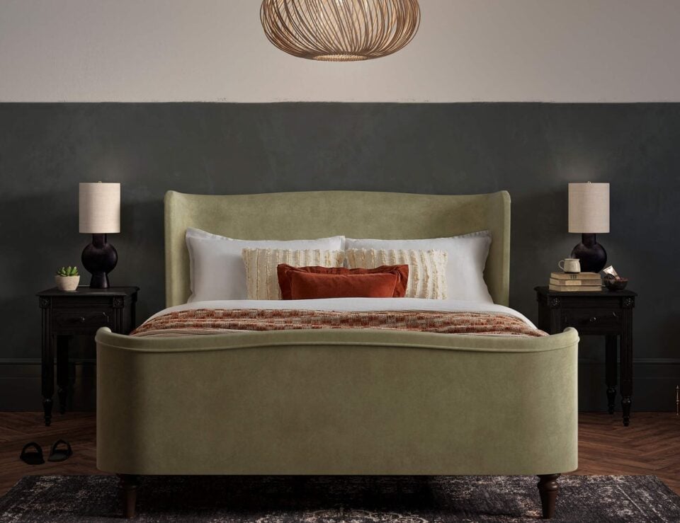 Charlotte upholstered king bed styled in a bedroom