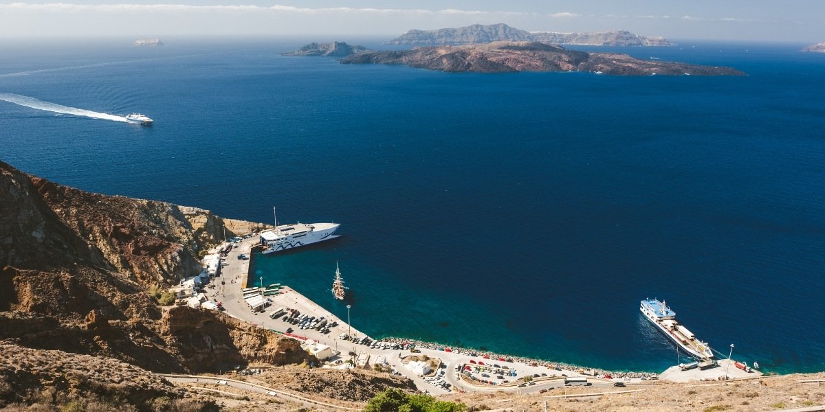 Athinios port beneath the cliffs of Santorini