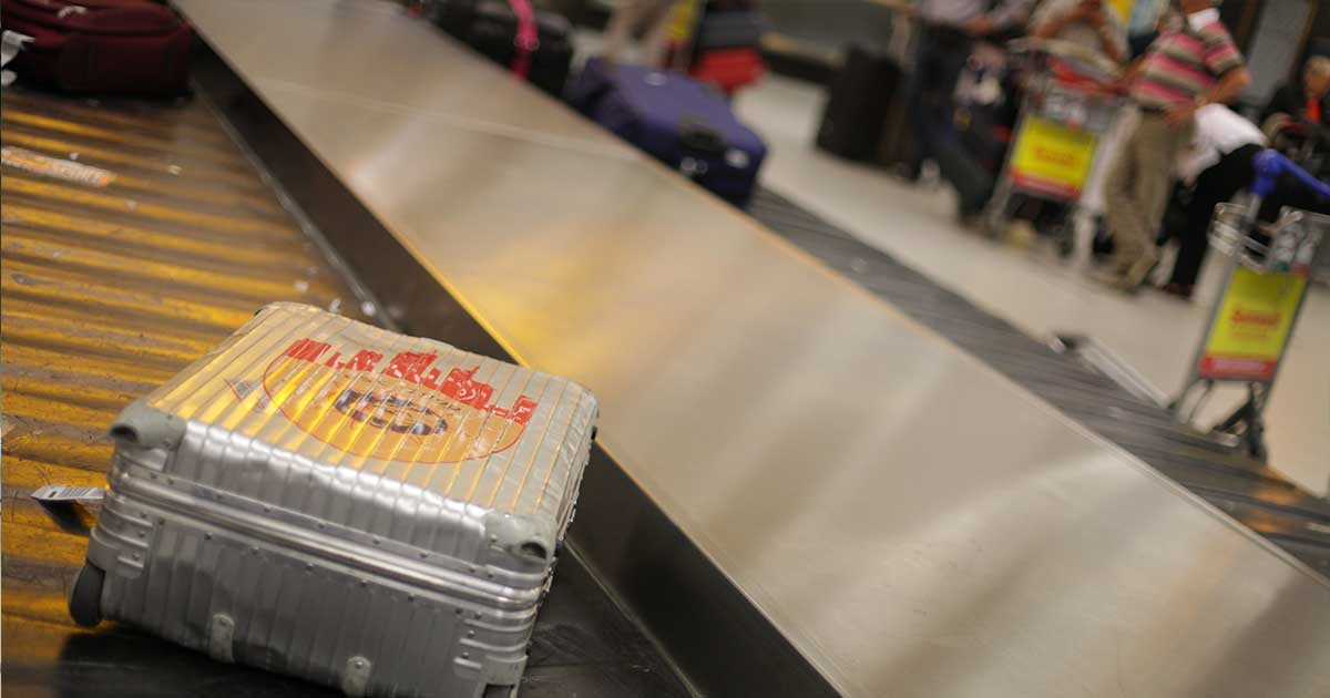 Koffer als Symbol fuer verspaetetes oder verlorenes Fluggepaeck
