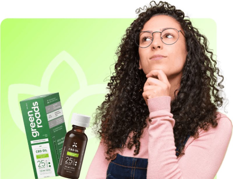 Woman with CBD oil products