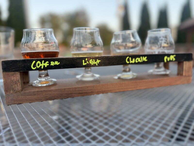 Beer flight served at a rustic craft brewery and gastropub