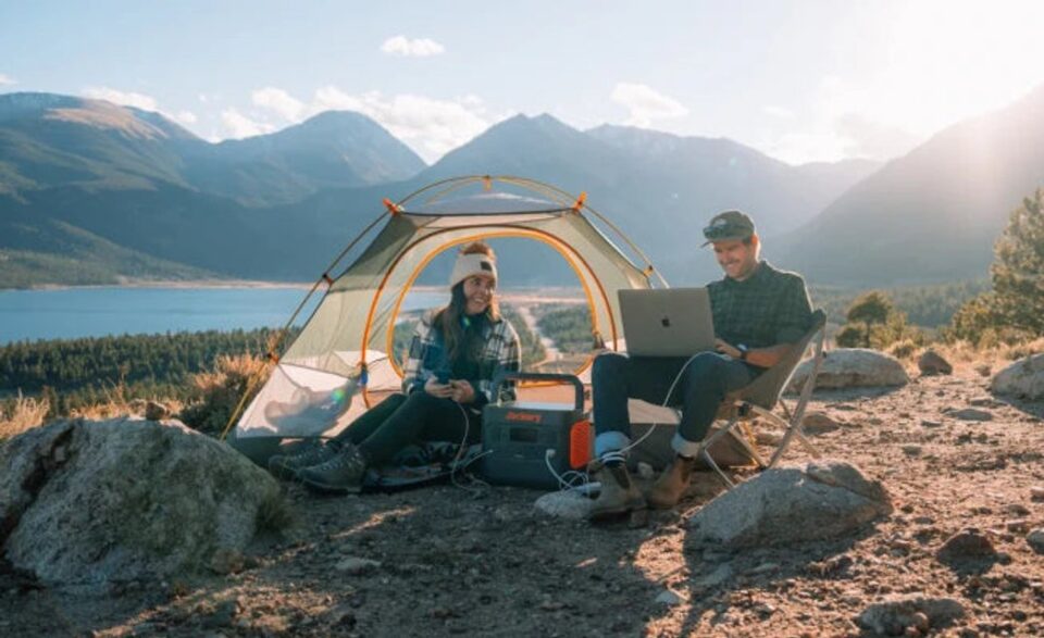 Jackery solar generator powering a camping setup outdoors