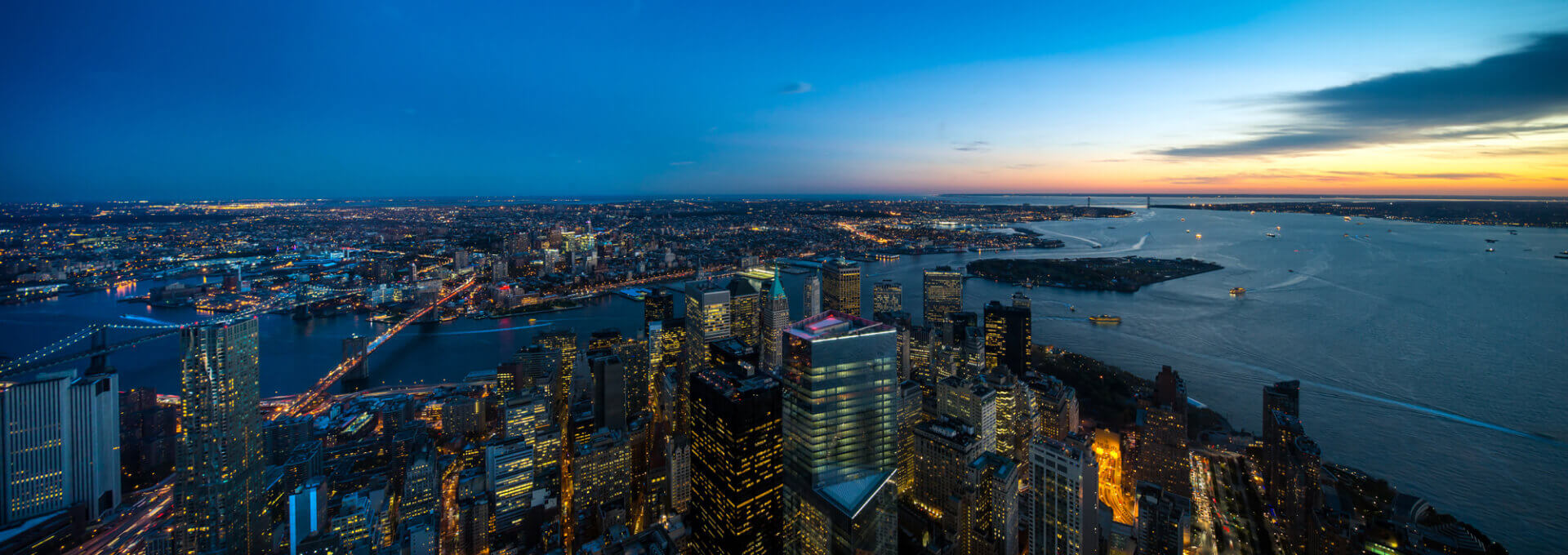 Manhattan skyline at dusk seen from the One World Observatory area