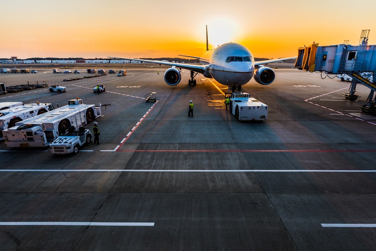 Airport terminal interior with travellers