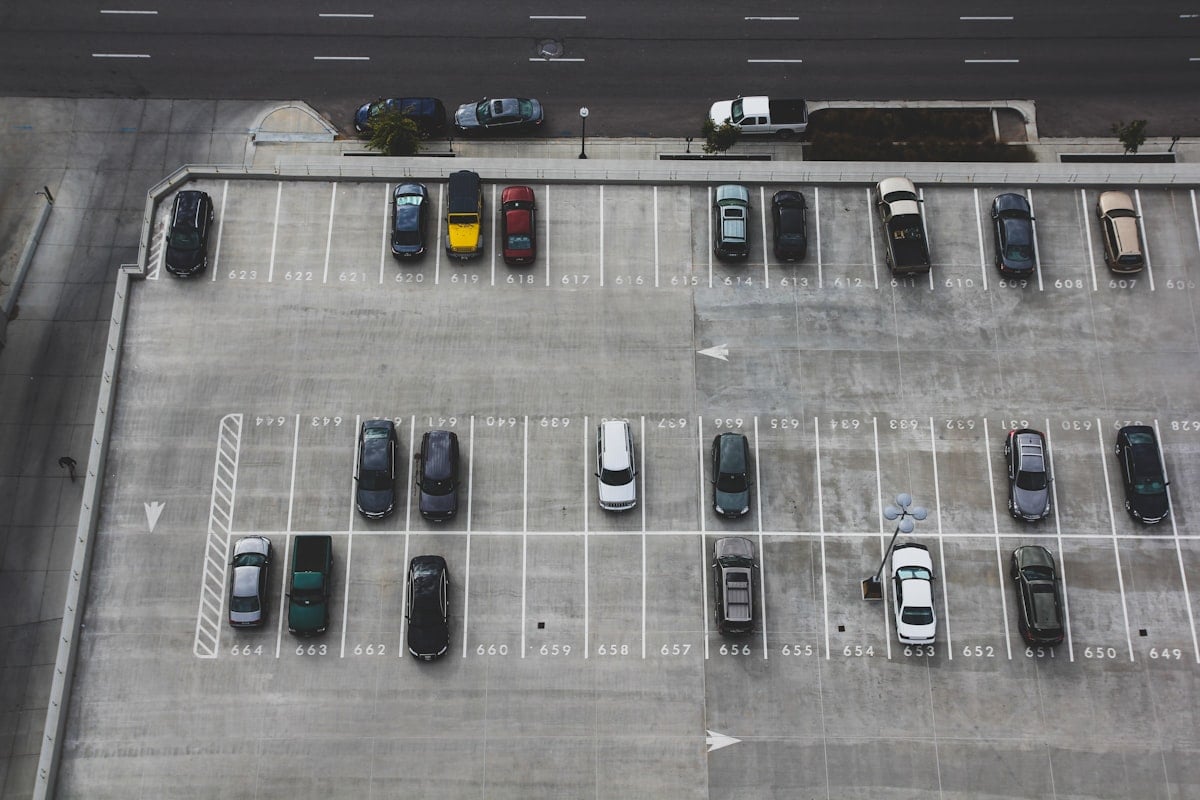 Cars parked in an outdoor car park