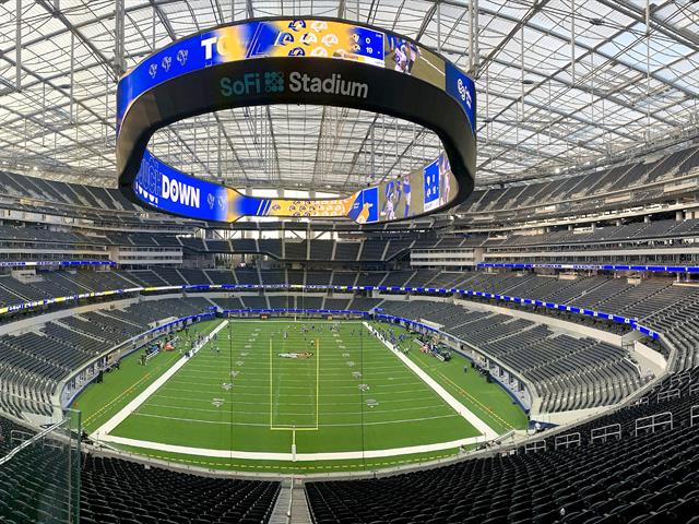 SoFi Stadium interior beneath its translucent canopy