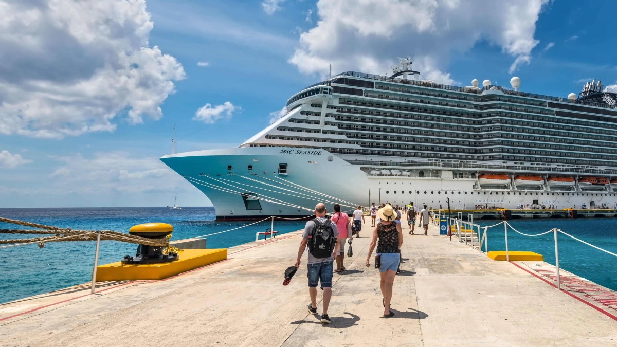 Cruise ship docked at a pier near Cozumel island