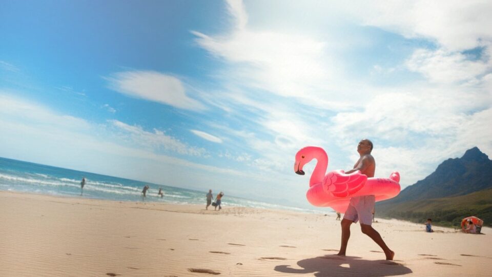 Traveller enjoying a bright flamingo-themed holiday scene