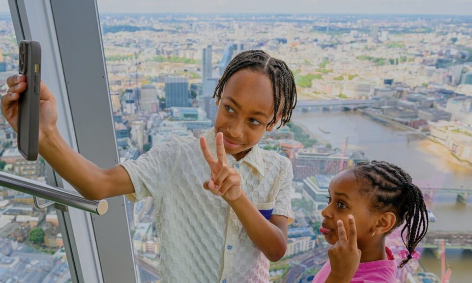 Family looking across London from The View from The Shard