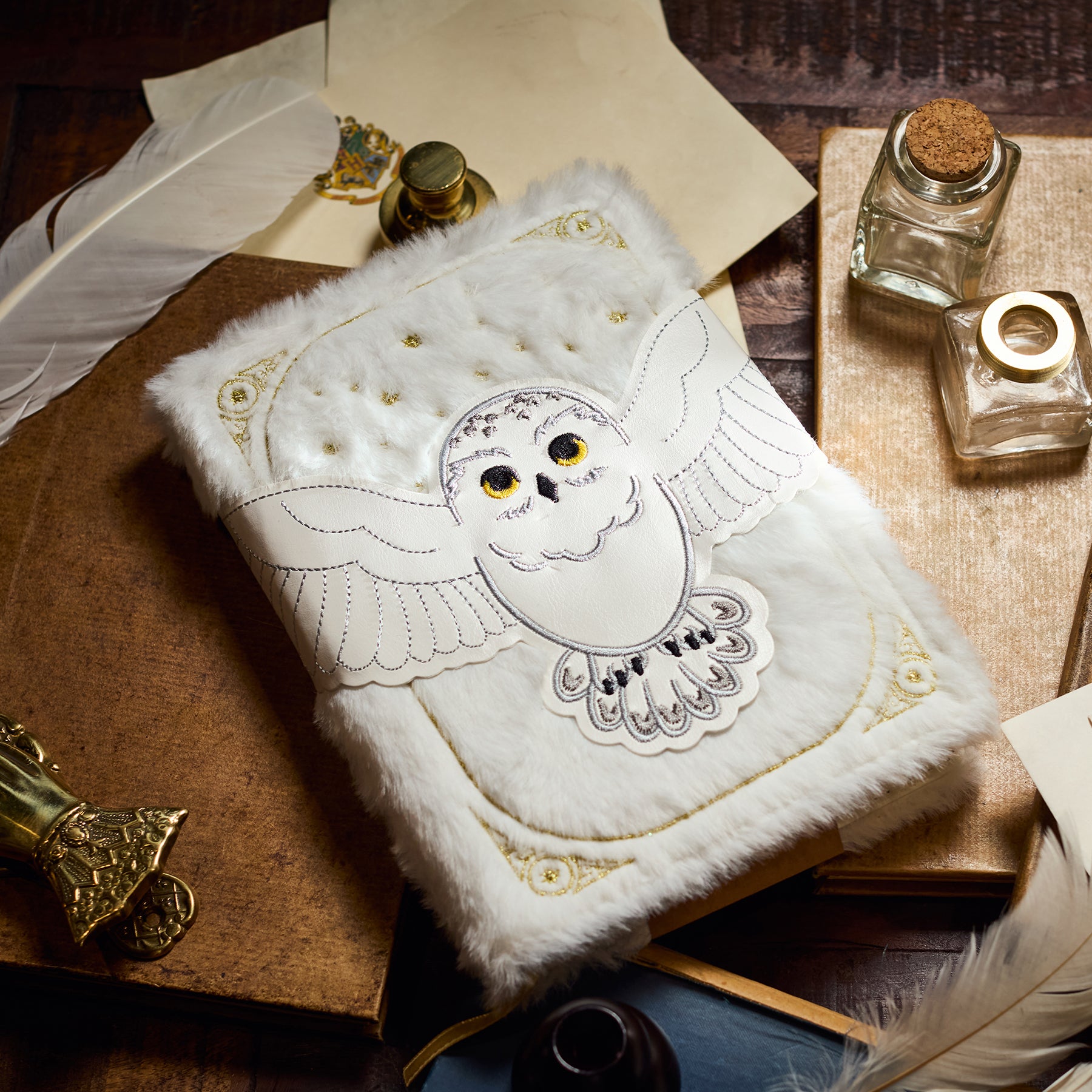 Plush Hedwig notebook with soft white cover and gold details