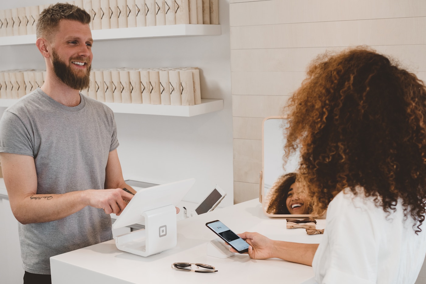 Customer paying at a service counter
