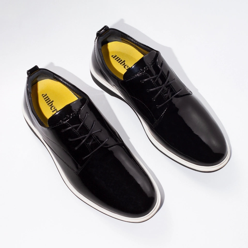 Amberjack The Tux Onyx dress shoe shown diagonally