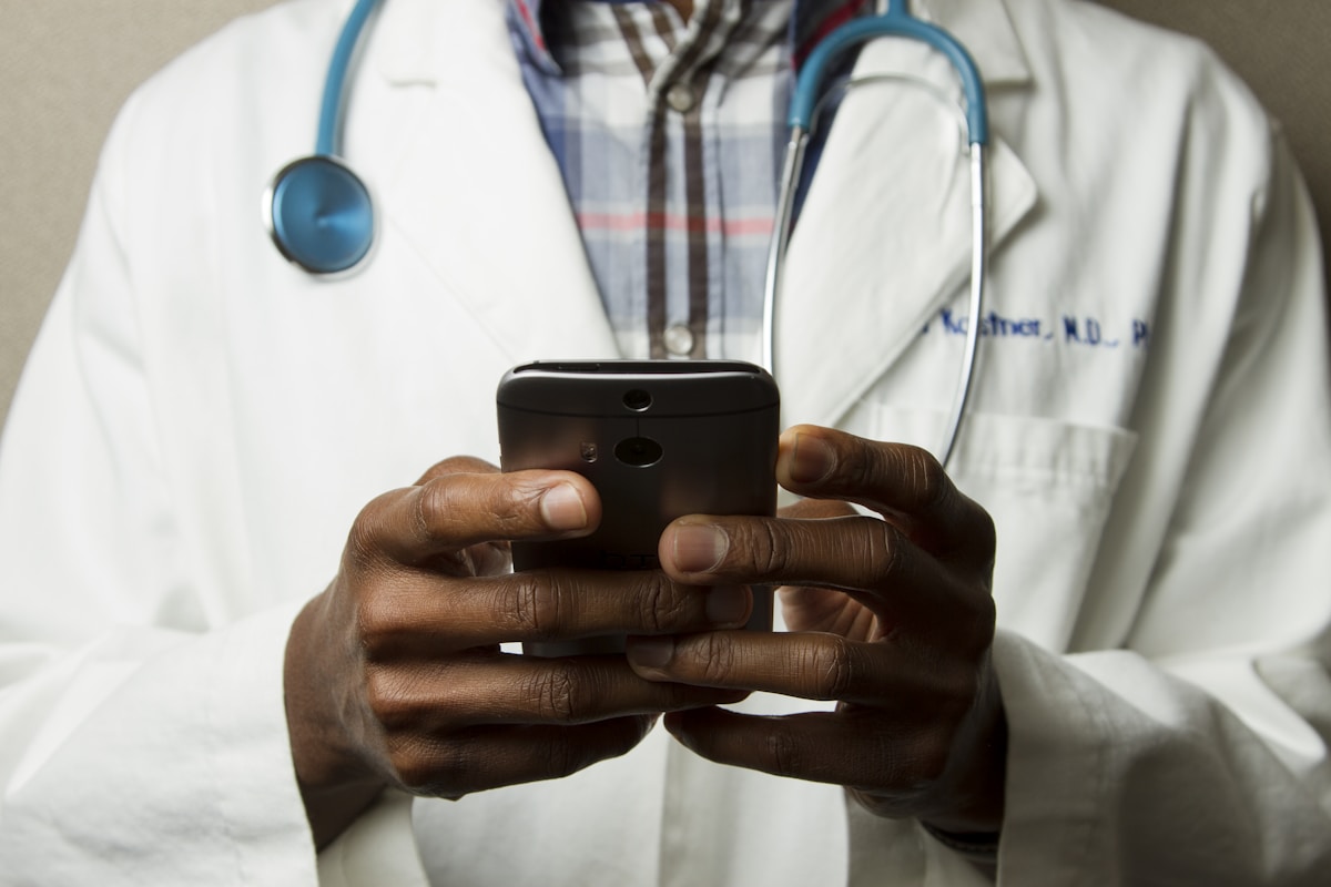 Medical professional studying online at a laptop
