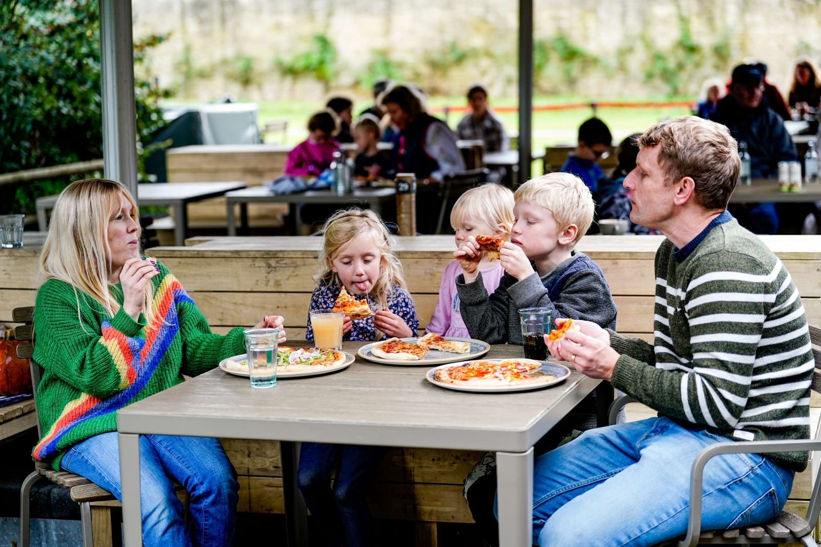 Family eating pizza in the Walled Garden at Blenheim Palace