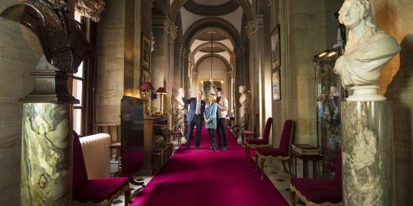 Visitors exploring the historic rooms of Blenheim Palace