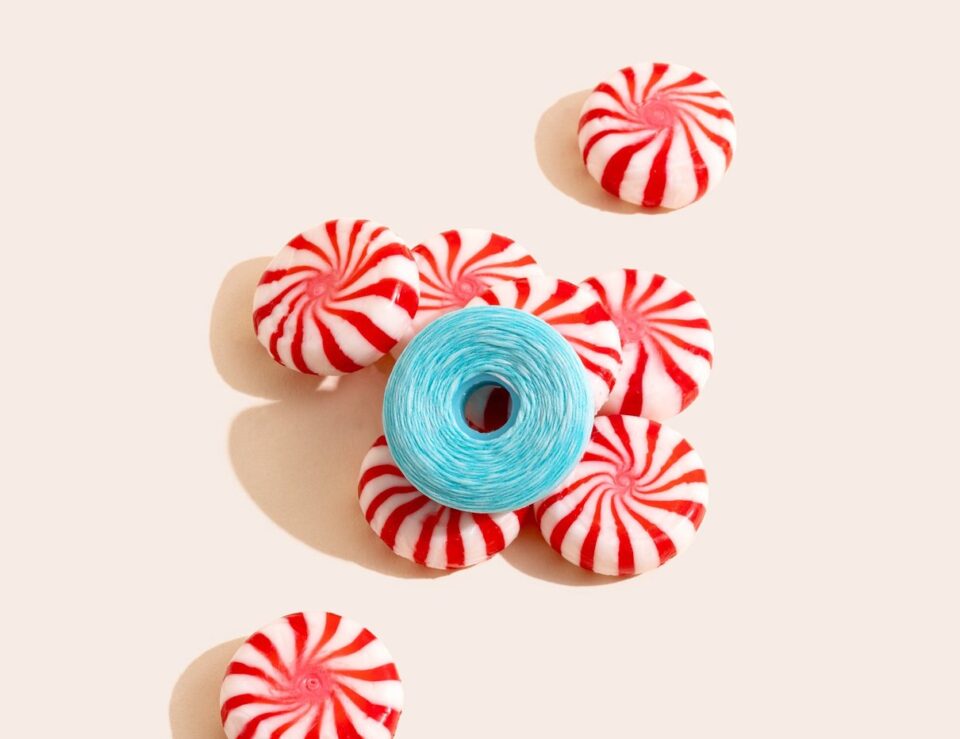 Pure Peppermint floss refill on a beige background