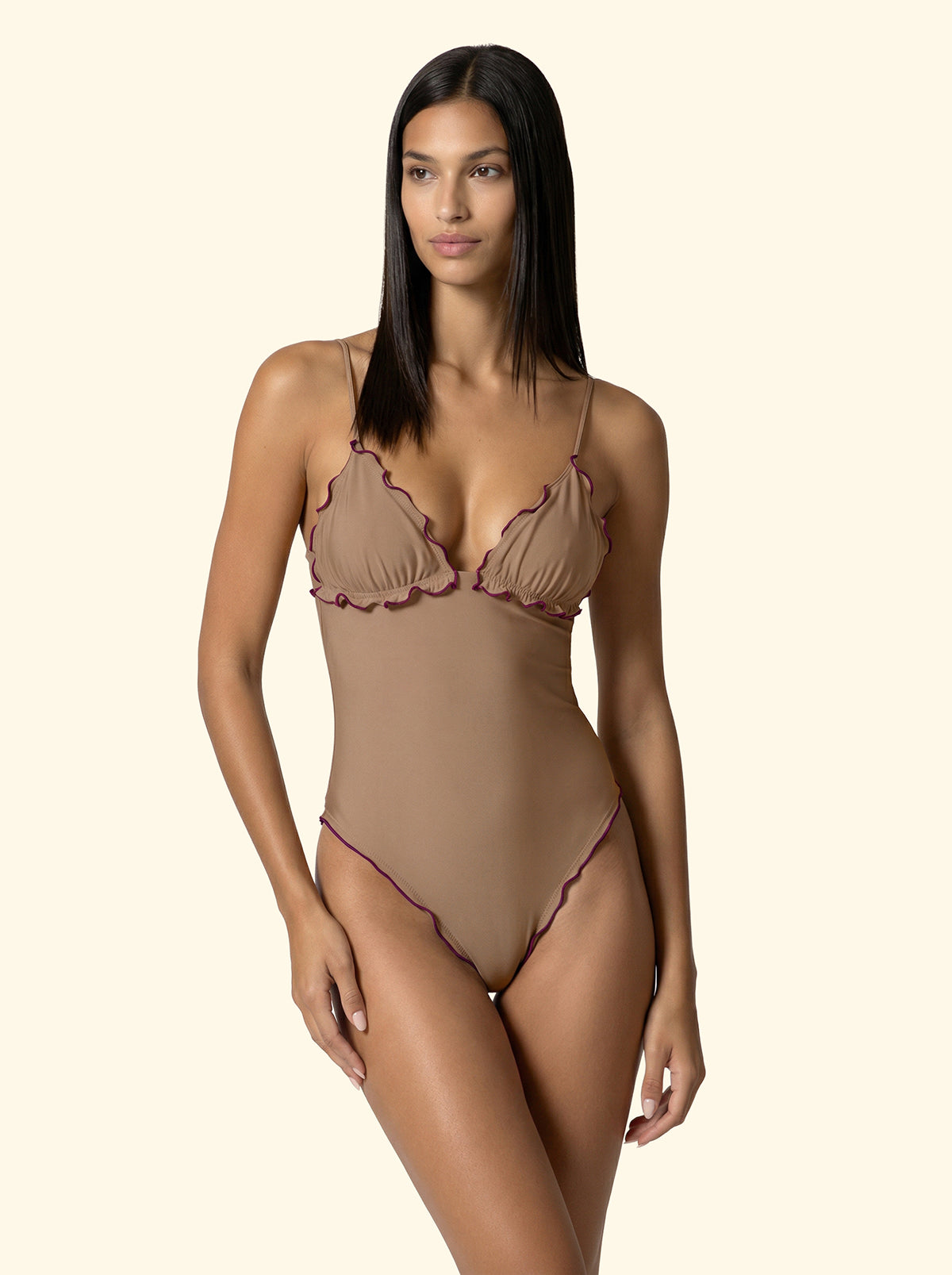 Model in taupe monokini