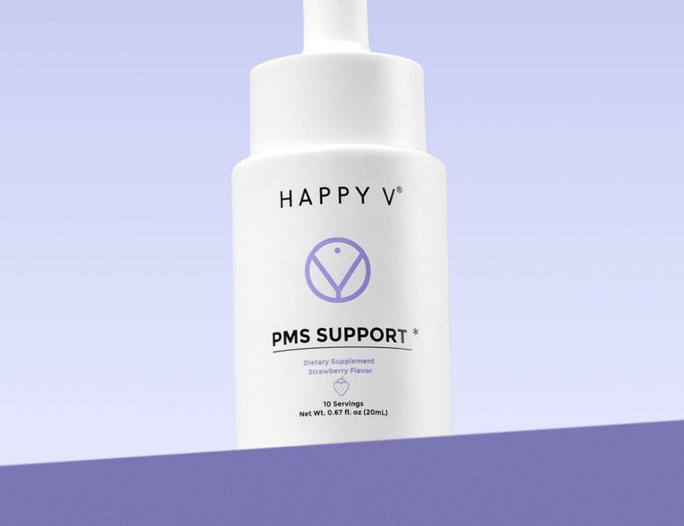 Happy V PMS Support bottle styled for a cycle wellness routine
