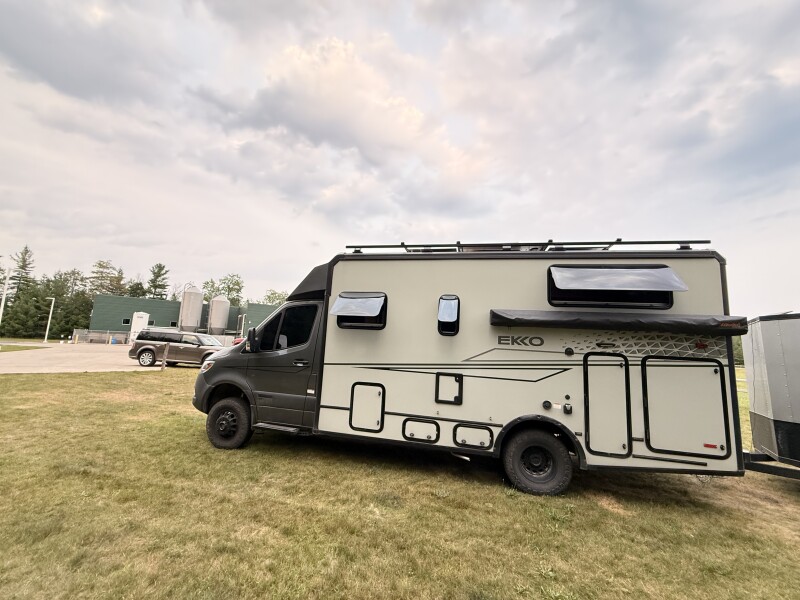 RV parked beside a building at a rural Host location