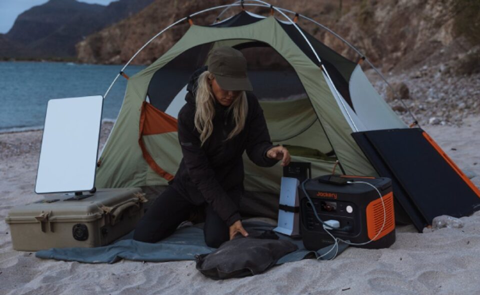 Beach campsite with a portable power station