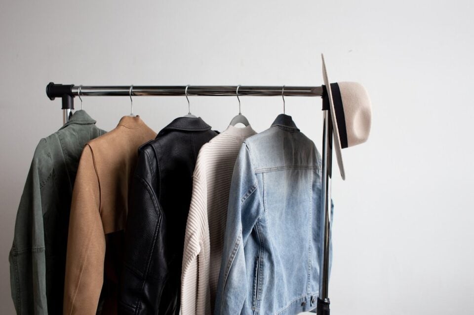 Selection of spring clothes arranged on a garment rack