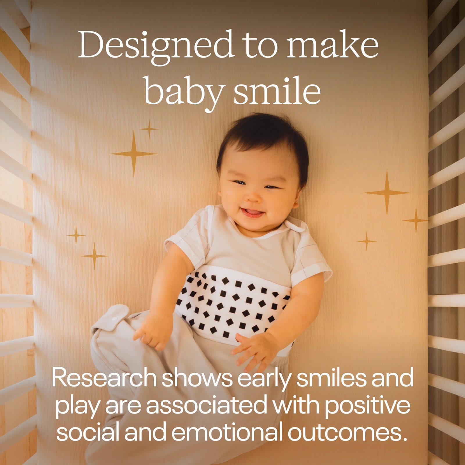 Smiling baby resting in a crib