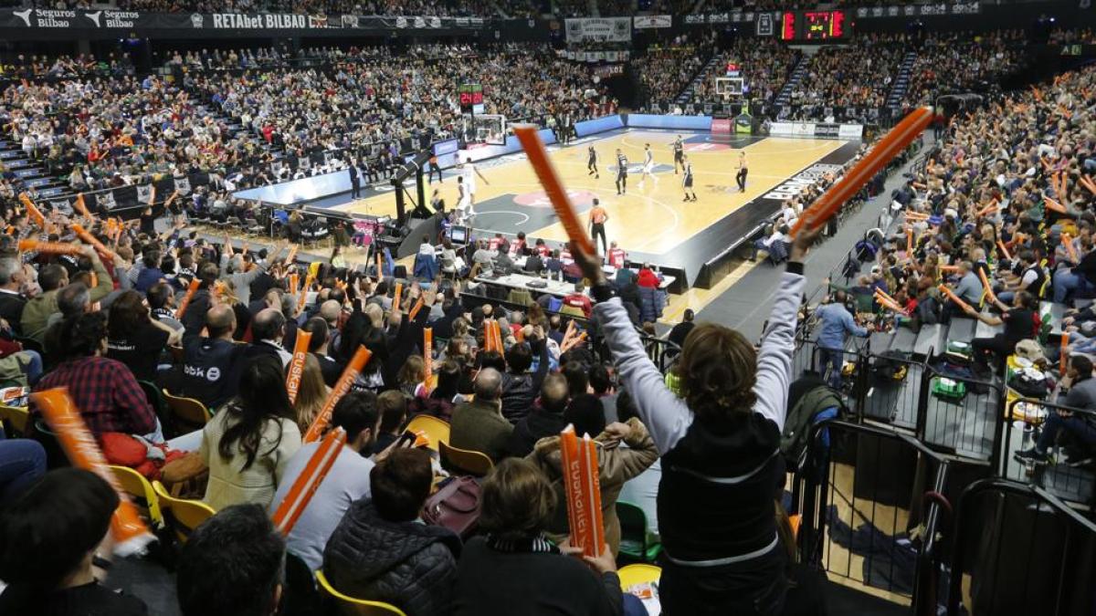 Packed basketball arena during a live game