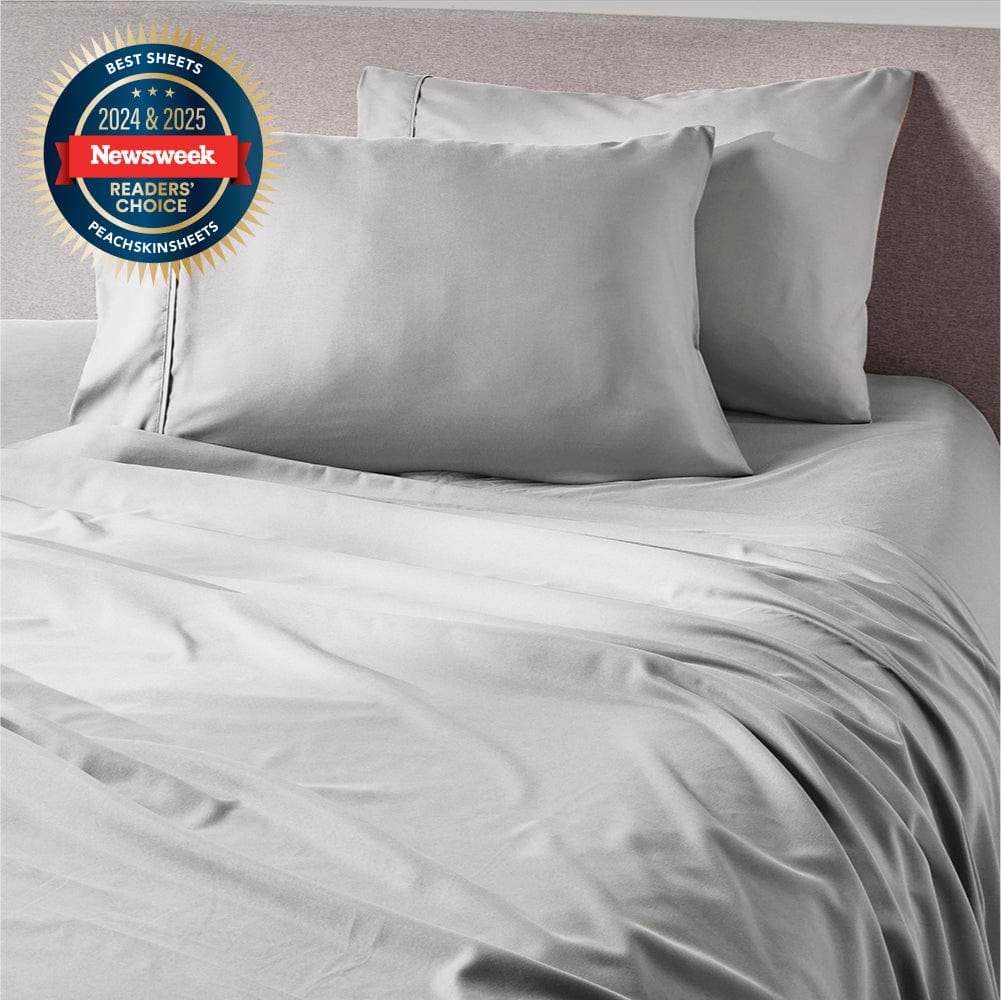 Brushed Silver PeachSkinSheets sheet set on a made bed