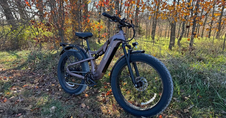 Puckipuppy electric bike in a wooded outdoor scene