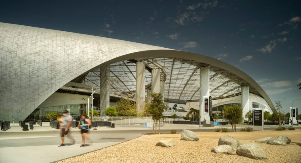 SoFi Stadium's sweeping translucent canopy and open-air architecture