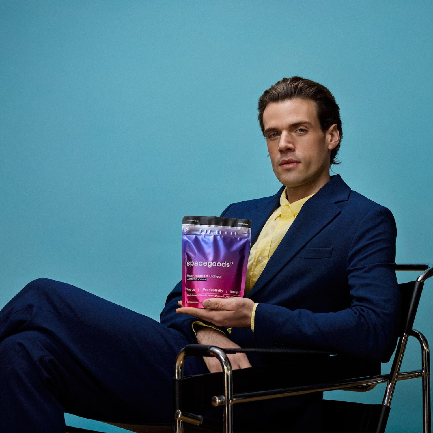 Man holding a Spacegoods Rainbow Dust pouch