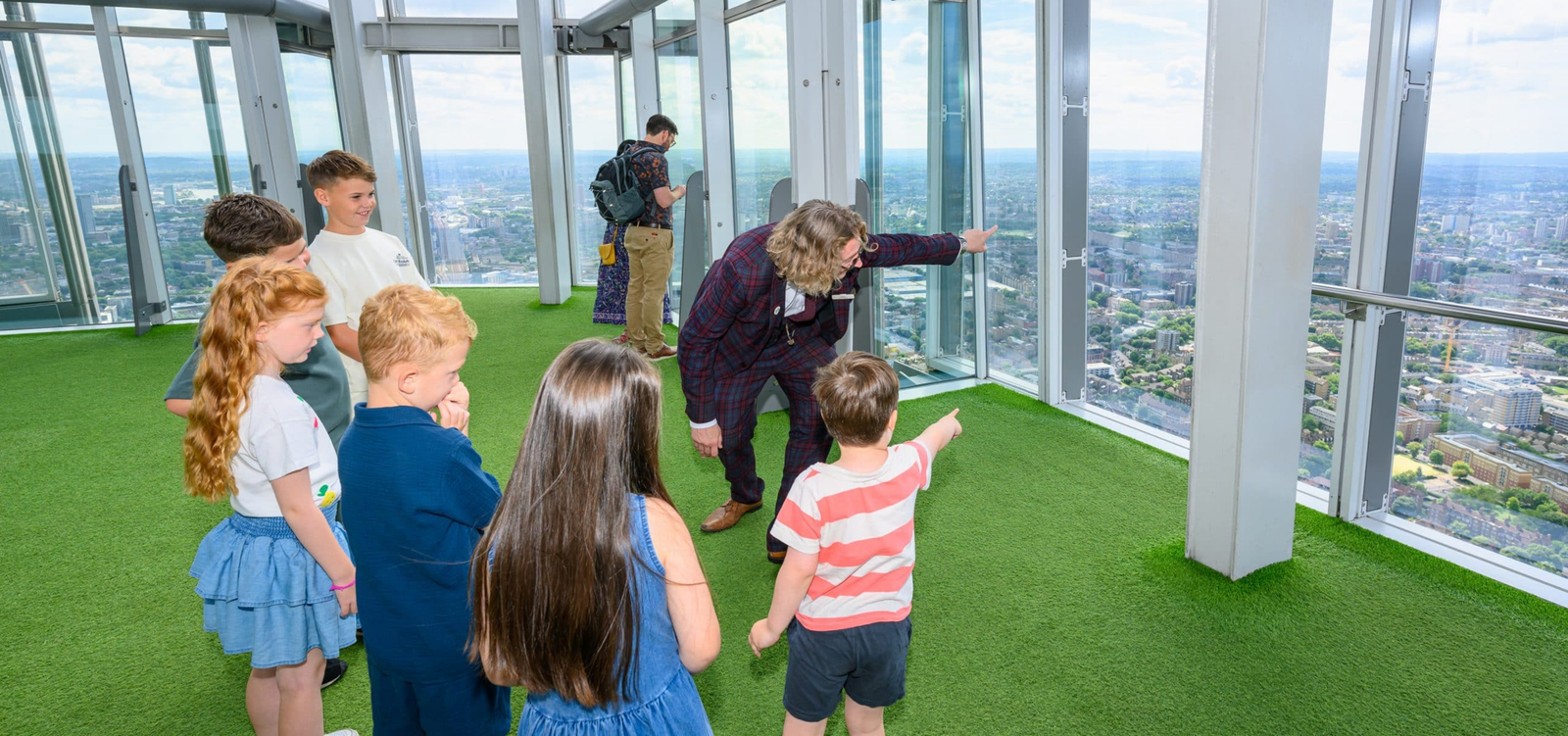 Children looking out over London from The View from The Shard