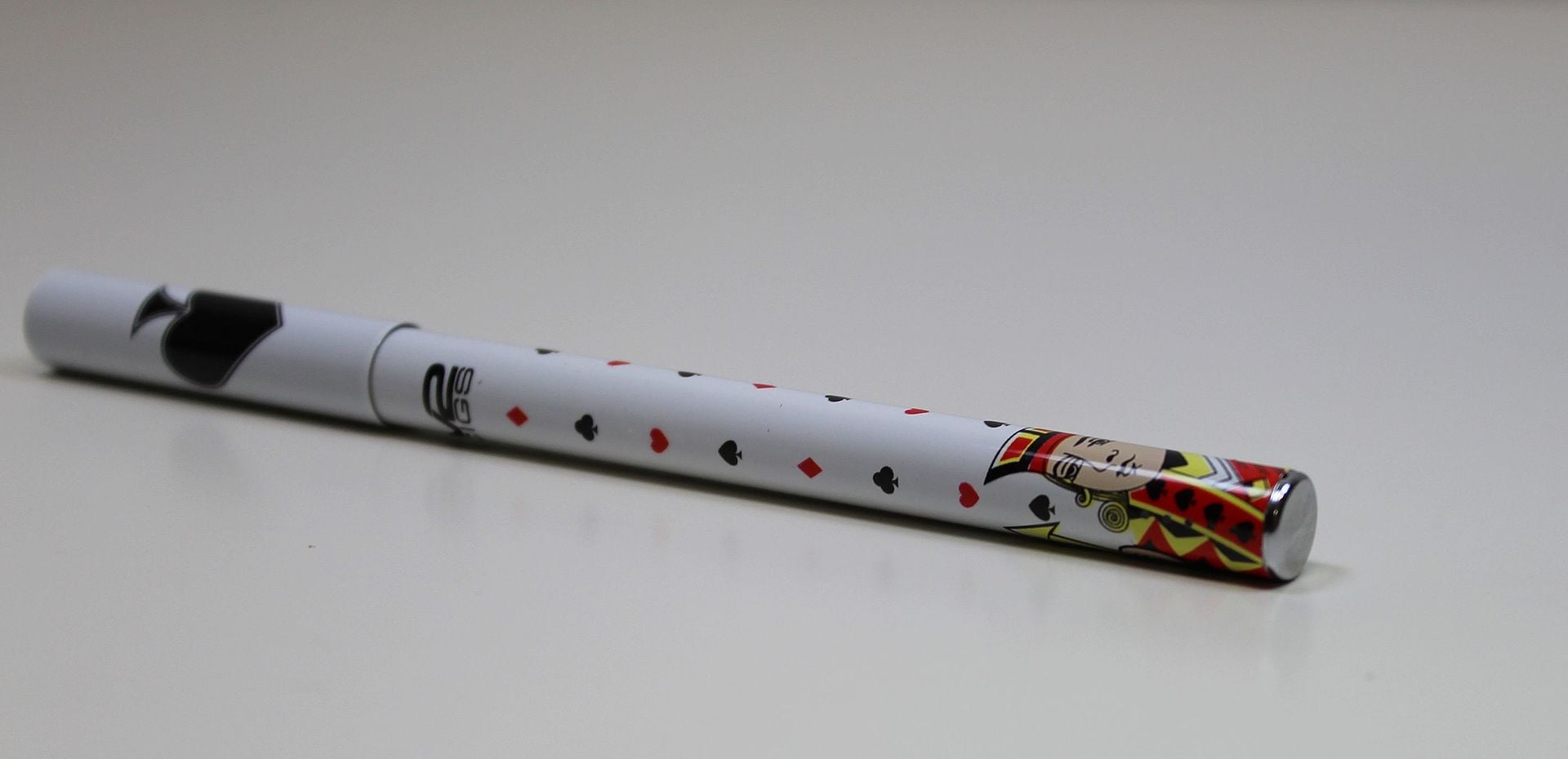 Slim electronic cigarette device on a clean background