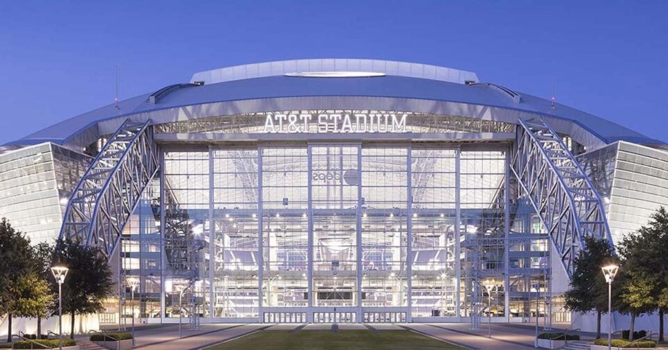 Exterior view of AT&T Stadium at dusk