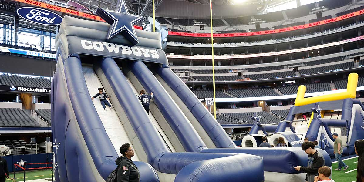 Cowboys inflatable stadium slide at Rally Days