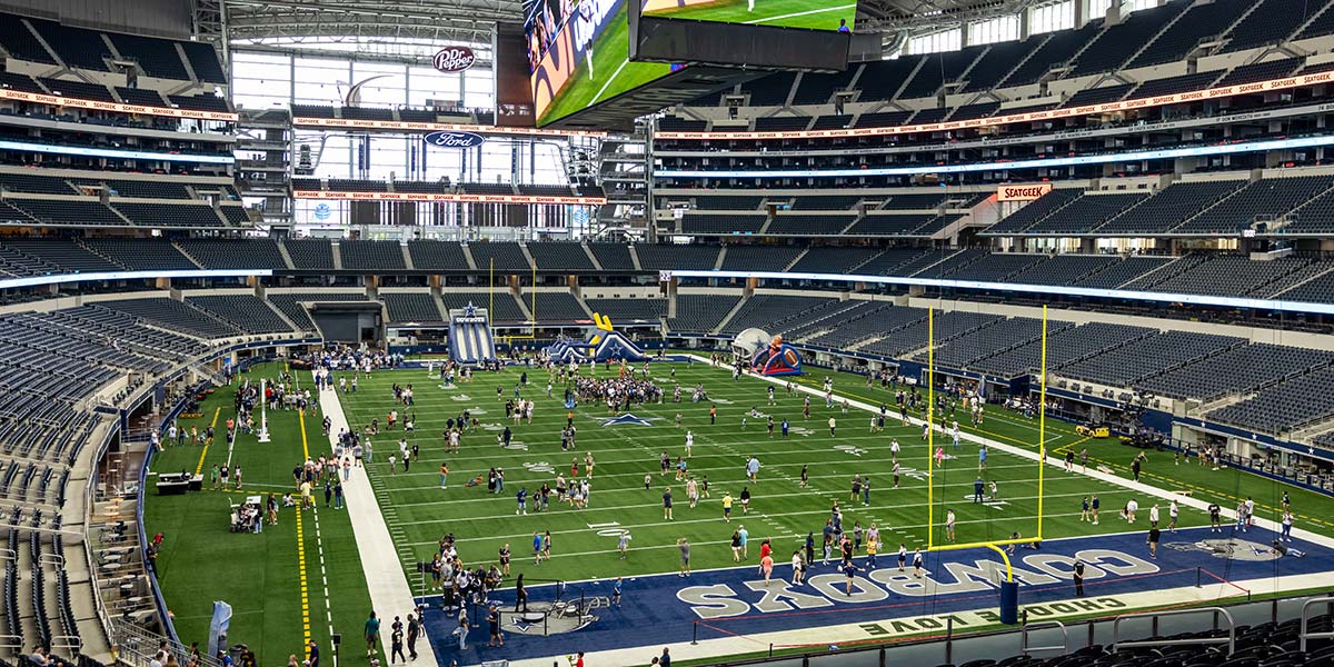 A group on a guided Rally Day tour inside the stadium