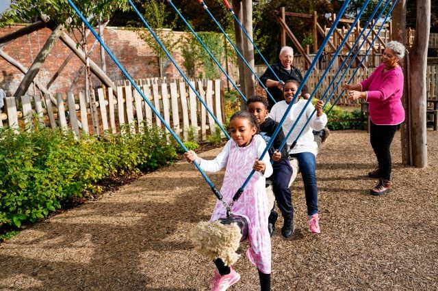 Children playing in the Adventure Play water area