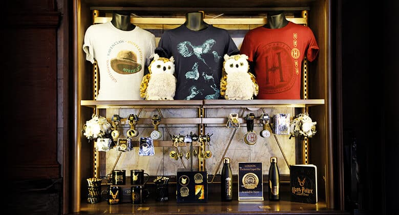 Official show merchandise displayed at the theatre gift shop