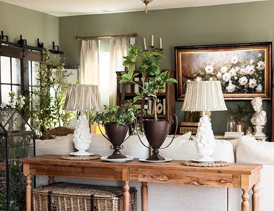 Natural wood console table with a weathered finish and drawers
