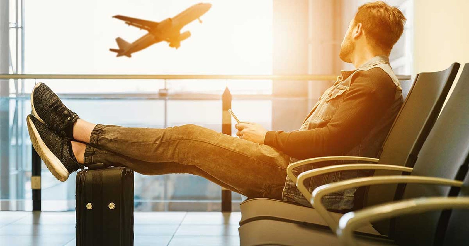Reiseszene zum Thema Flugverspaetung und Entschaedigung