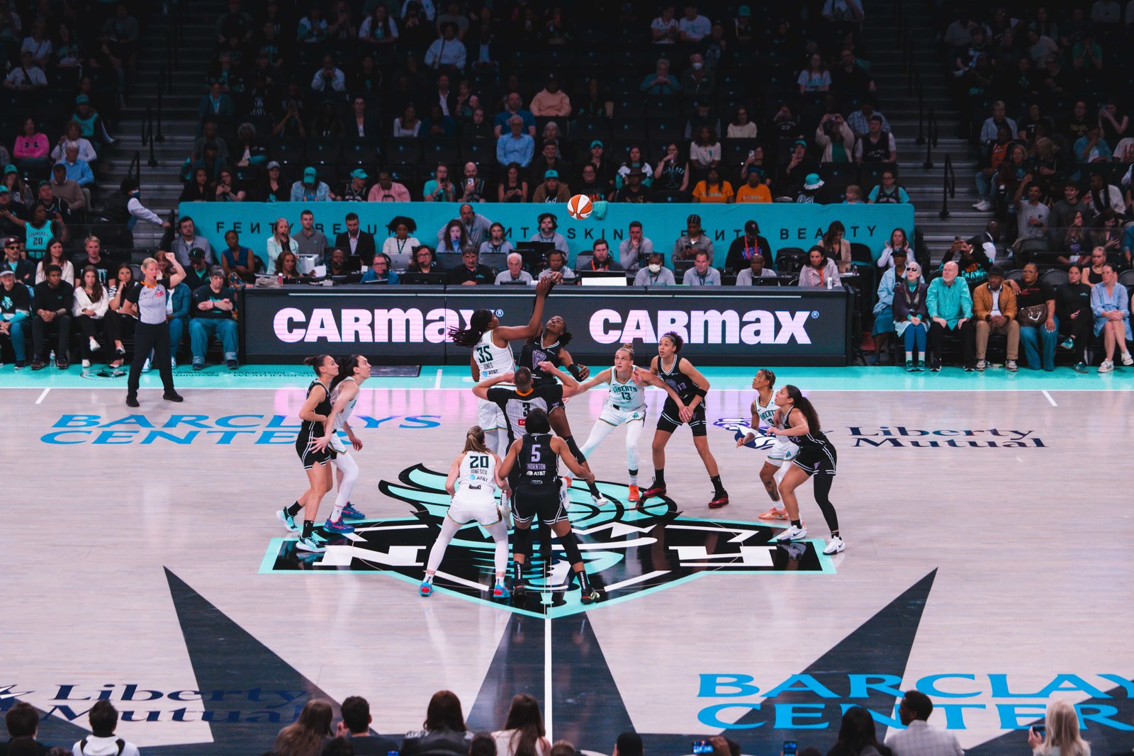 Players competing during a live basketball game