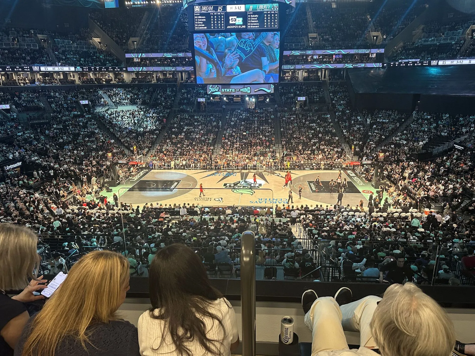Basketball game taking place inside an arena
