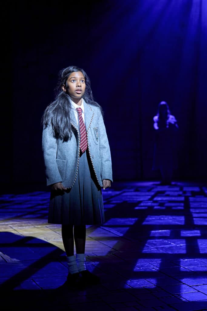 A portrait production photograph showing another Matilda stage moment
