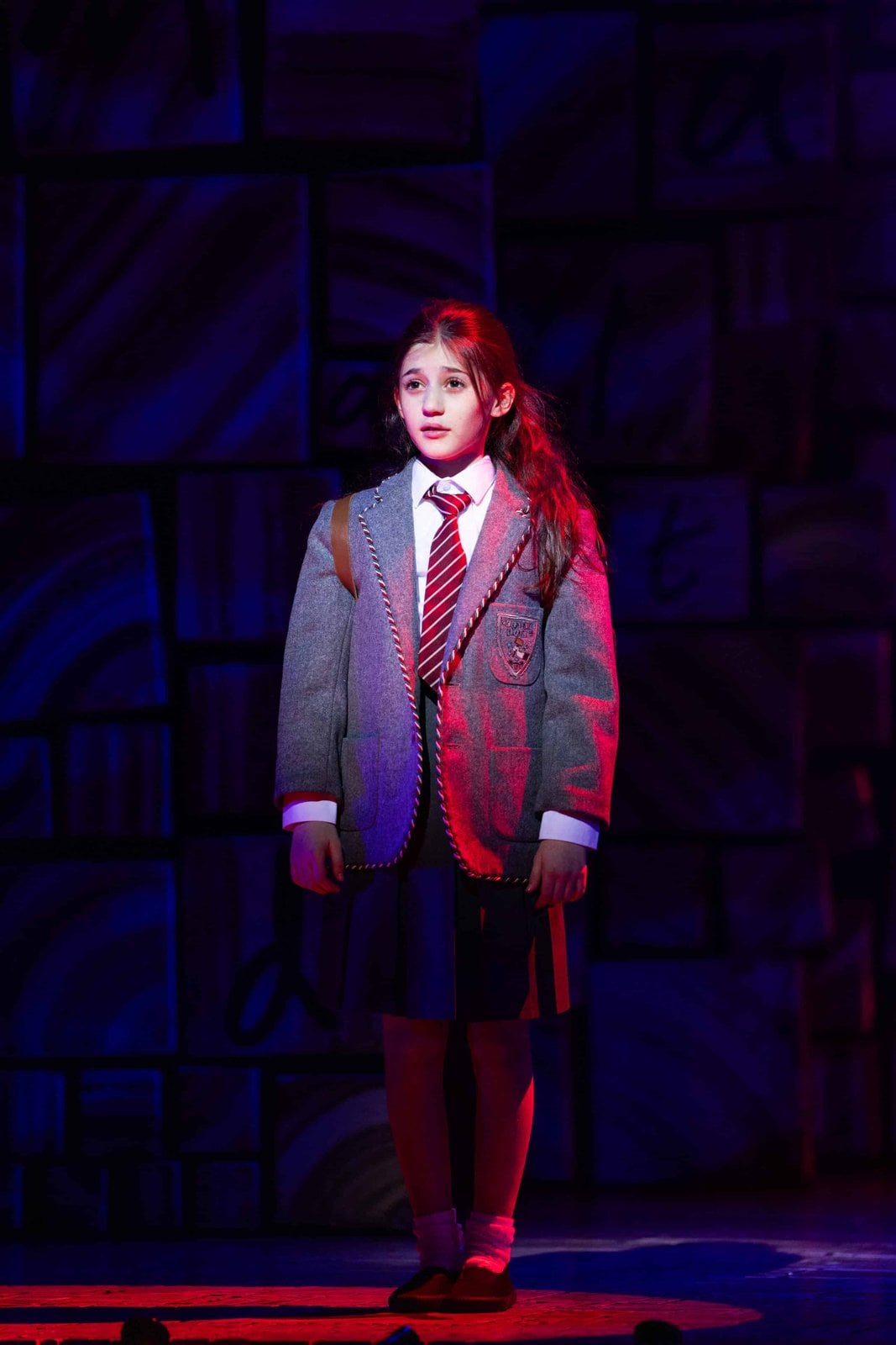 A dramatic scene from Matilda The Musical at the Cambridge Theatre