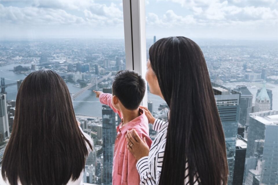 Family viewing the New York skyline from the observatory