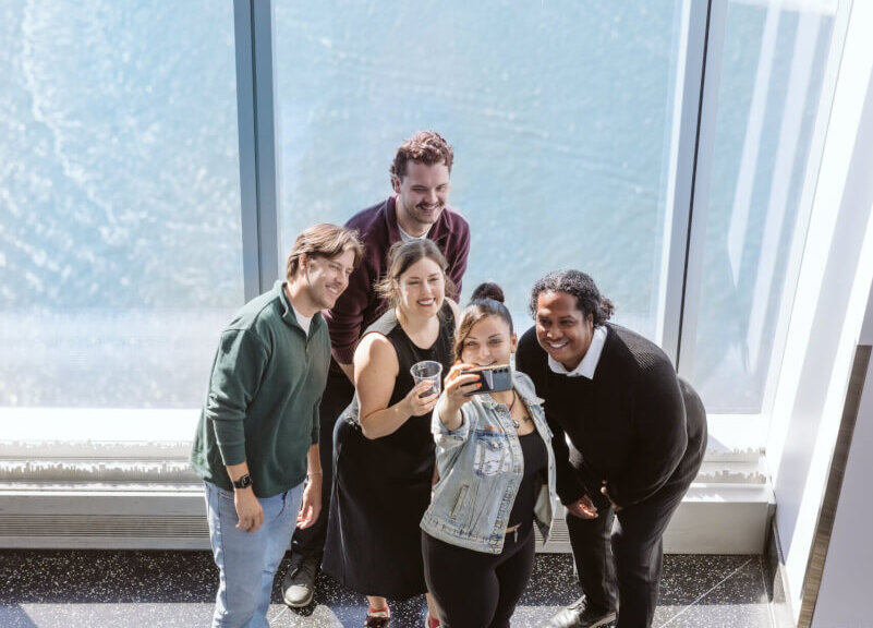 Visitors inside One World Observatory with city views