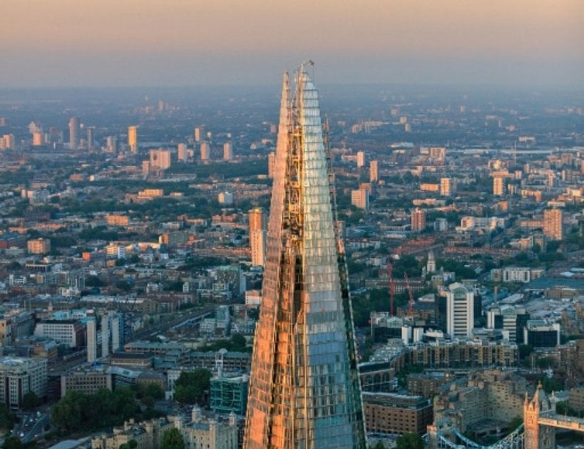 A visitor looking across London from The View from The Shard