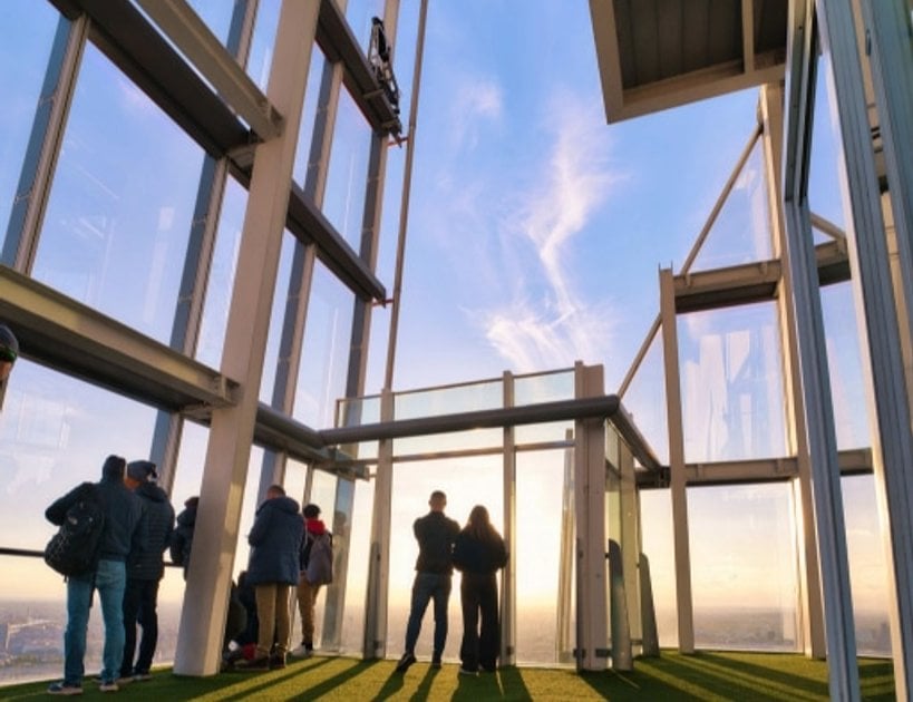 Visitors looking across London from The View from The Shard
