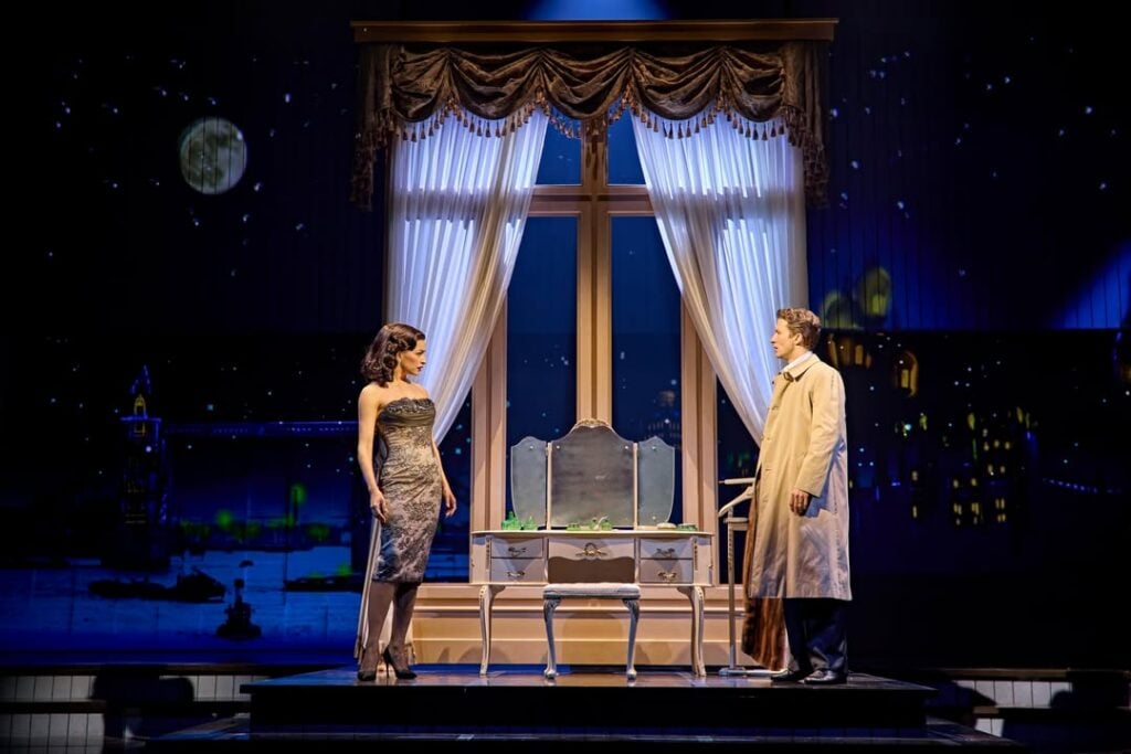 A performer in a Sinatra the Musical stage scene